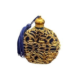 Vintage fancy gold bottle with tassel wand dabber